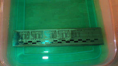 copper clad board taking a bath in some acid