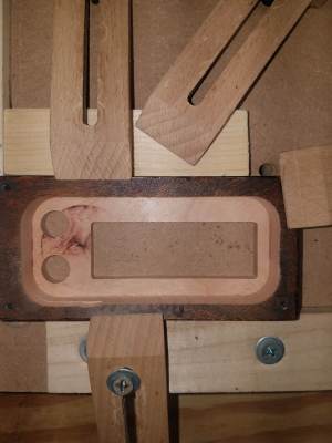 the top half, carved from behind, rough